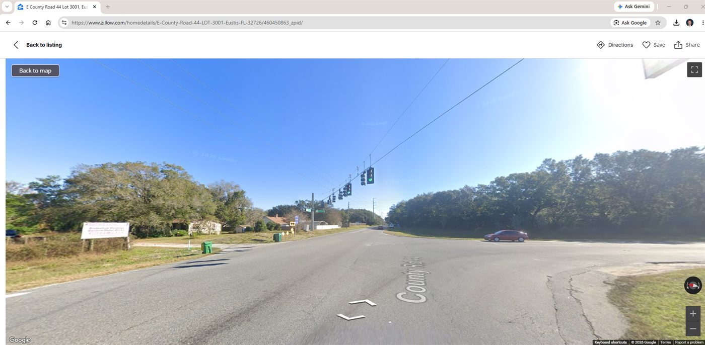 Signalized intersection of CR 44 and CR 44A looking west